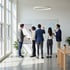 Team am Whiteboard mit Prompt-Liste