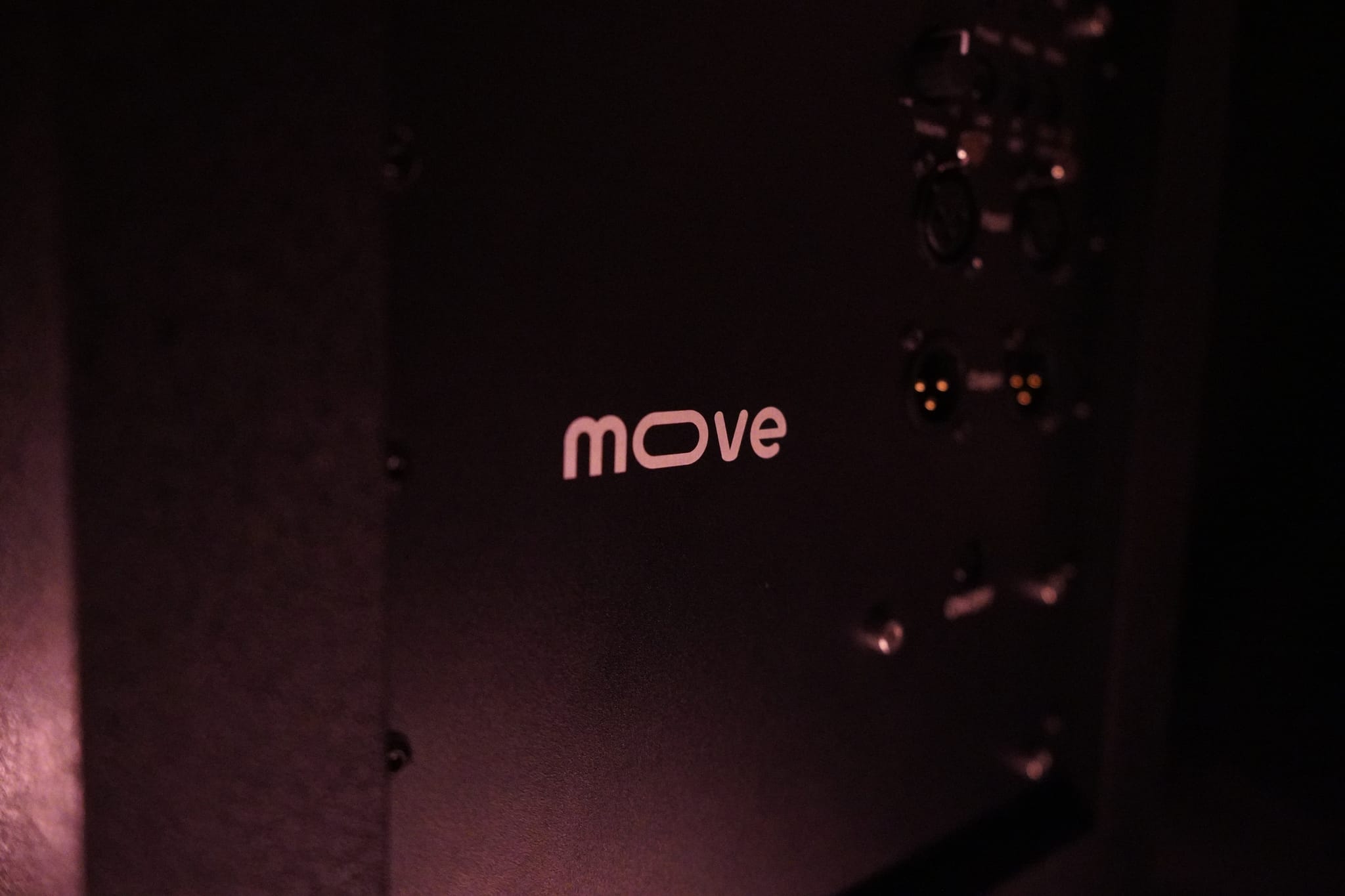 Laser etched Moove wordmark on the Sub 208 cabinet