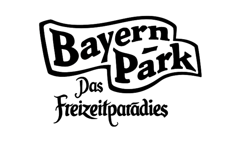 Schwarzes Logo mit dem Text "Bayern Park" in geschwungenen Buchstaben und darunter "Das Freizeitparadies".
