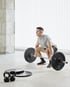 Man performing deadlift, highlighting the benefits of BPC-157 for recovery