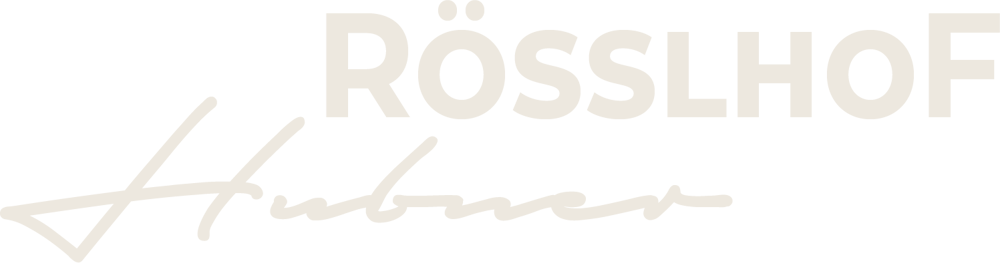Rösslhof Hubner Logo in Grün und Gold.
