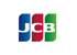 JCB-Logo mit „JCB“ in Weiß auf drei vertikalen, abgerundeten Feldern in Blau, Rot und Grün.