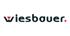 Wiesbauer Logo mit rotem Dreieck über dem "W" und rotem Punkt nach dem "r".
