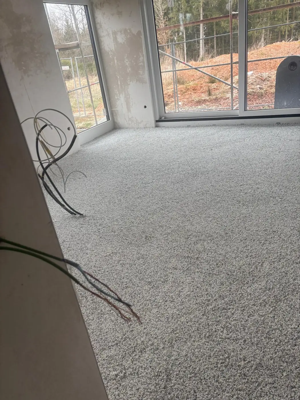 Fertig eingebrachter Leichtausgleichestrich im Rohbau