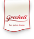 Grocholl Logo auf weißem Banner mit rotem Rand, darunter der Slogan "Aus gutem Grund."