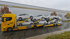Autotransporter der Hess Fahrzeuglogistik mit 8 weißen Fahrzeugen beladen.