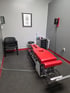 Exam room with adjustment table, representing a pain control clinic.