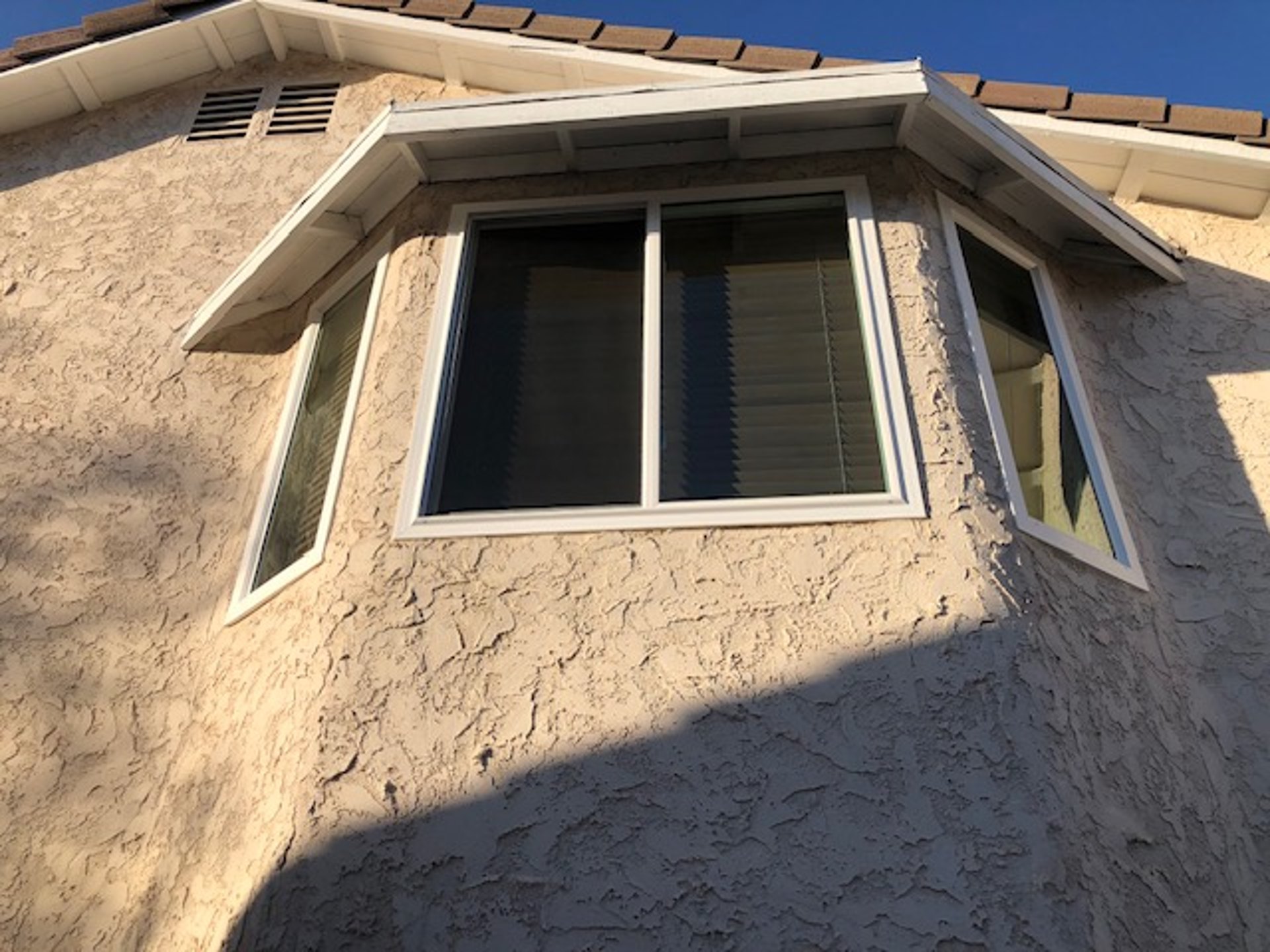 Bigelow style home with new vinyl windows replaced