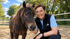 Franziska Müller mit Pferd in der Reitbahn