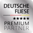 Silbernes Siegel Deutsche Fliese Premium Partner mit fünf Sternen und einer Linie in den Deutschlandfarben Schwarz-Rot-Gold.