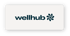 Wellhub-Logo mit dunkelblauem Schriftzug und stilisiertem Sternsymbol auf weißem Hintergrund.
