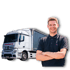 Ein lächelnder Mann mit Brille und verschränkten Armen steht vor einem weißen LKW mit „STRIEBICH“-Logo.