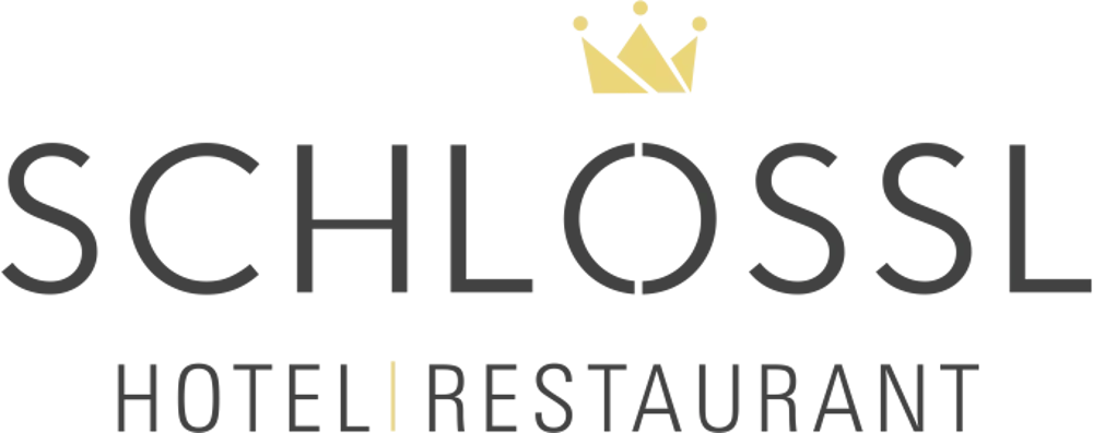 Logo des Schlössl Hotel Restaurant mit einer goldenen Krone auf schwarzem Hintergrund.