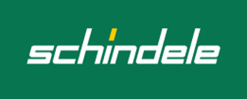 Schindele Logo mit weißem Text und gelbem Punkt über dem "i" auf dunkelgrünem Hintergrund.