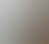 Lachende Zahnarzthelferin der Zahngesundheit Eifel mit Brille und Maske am Ohr, vor einem Bildschirm mit Röntgenbild. Aufschrift: #WORK SMILE BALANCE.