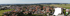 Panoramaaufnahme eines Dorfes mit roten Ziegeldächern, angrenzenden Feldern und Gemeindewappen im Vordergrund.