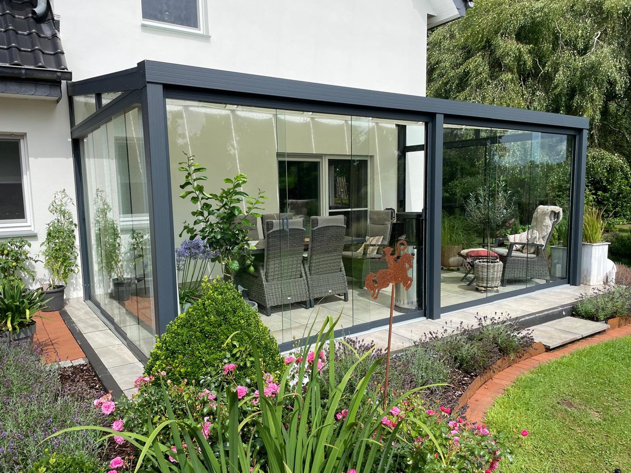Kaltwintergarten mit Glasschiebewänden