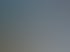 Ein blaues Gebäude mit einem weißen Schild, auf dem "MEDIA Design • Content • Marketing" in brauner Schrift steht, und einer blauen Tür.