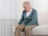 Older woman holding her knee — stiff knee and arthritis care at Accelerated Medical in Elko, NV
