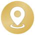 Biała ikona znacznika lokalizacji na złotym, okrągłym tle.