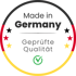 Rundes Siegel "Made in Germany" mit "Geprüfte Qualität" und grünem Häkchen, umrandet von der deutschen Flagge.
