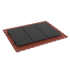 Drei schwarze Solarmodule auf einem roten Ziegeldach.