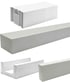 Four white autoclaved aerated concrete blocks in various shapes including a standard brick, a long lintel, and a U-block.