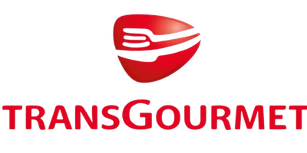 Rotes Transgourmet-Logo mit einer stilisierten Gabel in einem ovalen roten Symbol.