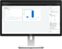 Sage Dashboard auf einem Dell Monitor mit Liniendiagramm, Balkendiagramm und einer Copilot-Chat-Seitenleiste.