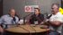 Two men, one bald with glasses, one with dark hair, sit at a table with microphones, "Ask the Surveyor" logo behind them.