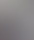 Buderus Luft-Wasser-Wärmepumpe in Schwarz-Grau auf Betonfundament an einem Haus im Umbau