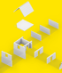 Exploded isometric diagram of a modular white building with roof panels, walls, and door frames on a yellow background.