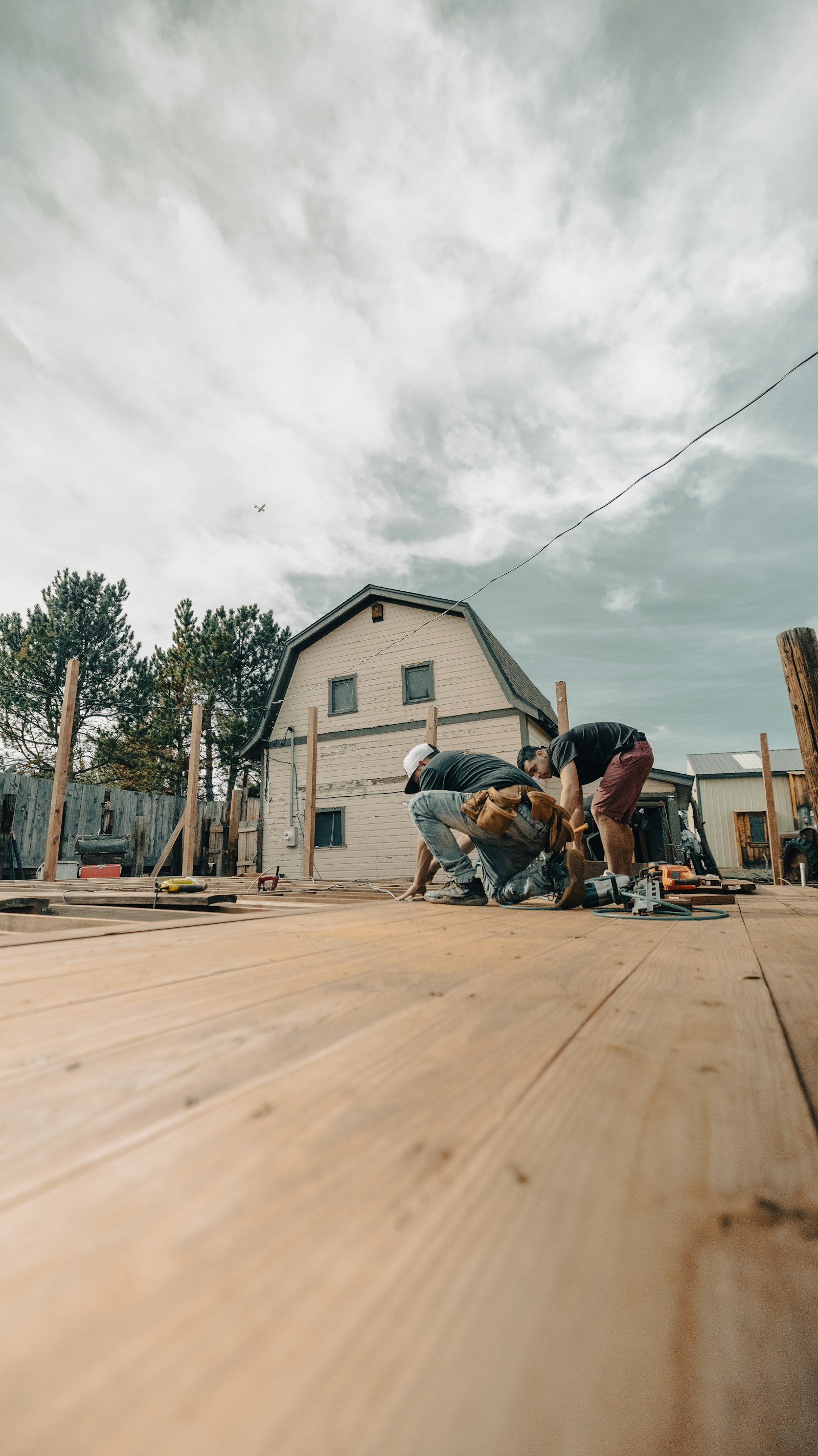 Installers building a fence at a home in Columbia, Maryland