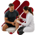 Doctor injects a knee to trigger cellular repair as the man watches.