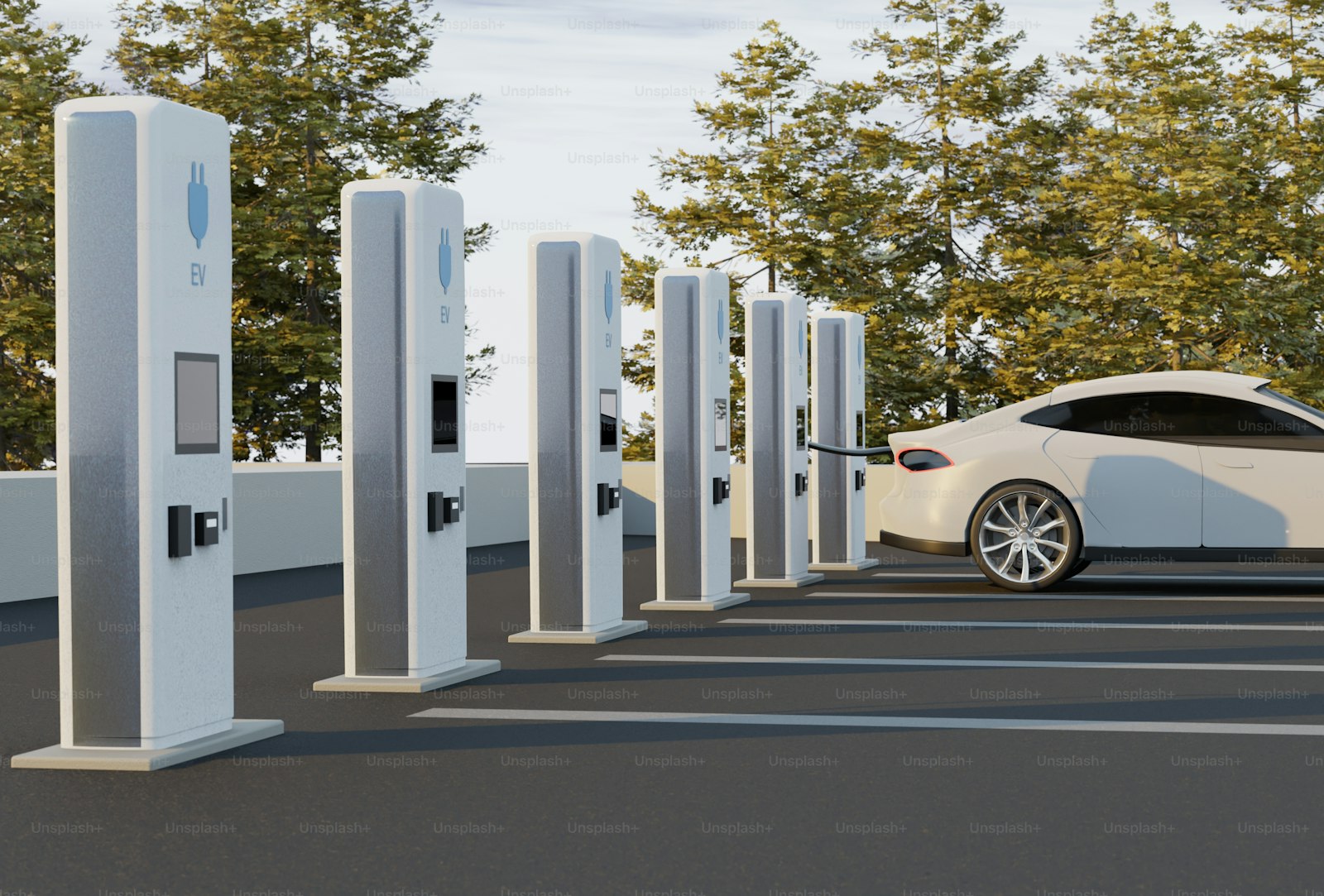 White electric car plugged into a charging station in a shared resident parking lot