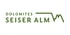 „Dolomites Seiser Alm“ Logo in Grün mit Bergsilhouette.