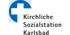 Blaues Kreuz in Kreis mit Text "Kirchliche Sozialstation Karlsbad" auf grünem Hintergrund.