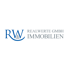 Logo von Realwerte GmbH Immobilien: RWA Monogramm mit Treppenmotiv, daneben "REALWERTE GMBH IMMOBILIEN" in Grau.