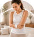 Woman holding her elbow in pain