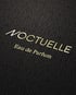 Parfumflakon Noctuelle in Form einer stilisierten schwarzen Bauhaus-Eule – exklusives Packaging Design