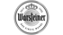 Rundes, silbernes Warsteiner-Logo mit Krone und den Worten „SEIT 1753“ und „DAS EINZIG WAHRE“.
