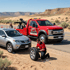 Towing Sandy flat tire change service replacing a damaged tire on a stranded vehicle while providing roadside assistance.