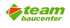 Grünes Logo der Firma team baucenter mit einem orange-grünen Rauten-Symbol auf schwarzem Hintergrund.