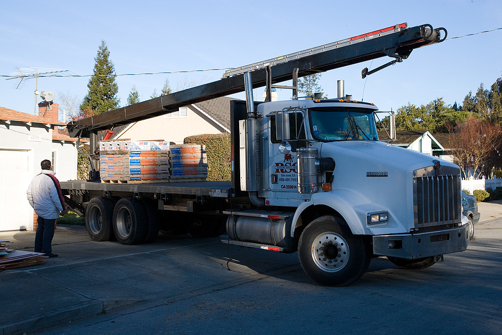 Roofing material being delivered to a Carrollton job site