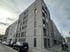 Außenputzarbeiten eines Rohbaus eines großen Wohnblocks mit modernster betonoptik und Farbgestaltung im Raum Ulm durch unseren Stuckateurbetrieb