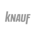 Grauer "KNAUF"-Schriftzug auf dunkelgrünem Hintergrund.