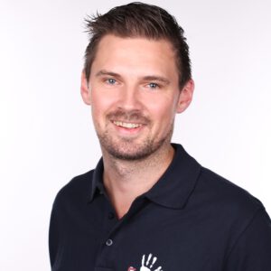 Porträt von Lars, fachliche Leitung Ergotherapie
