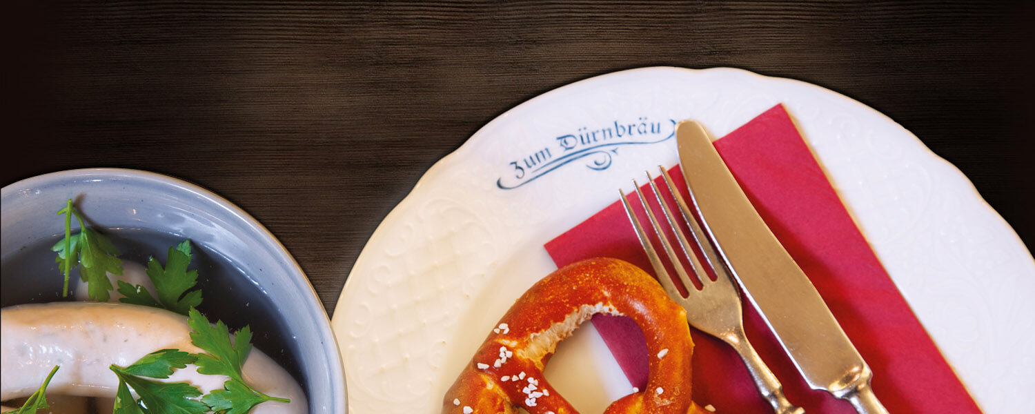 Gedeck mit Weißwurst und Brez’n