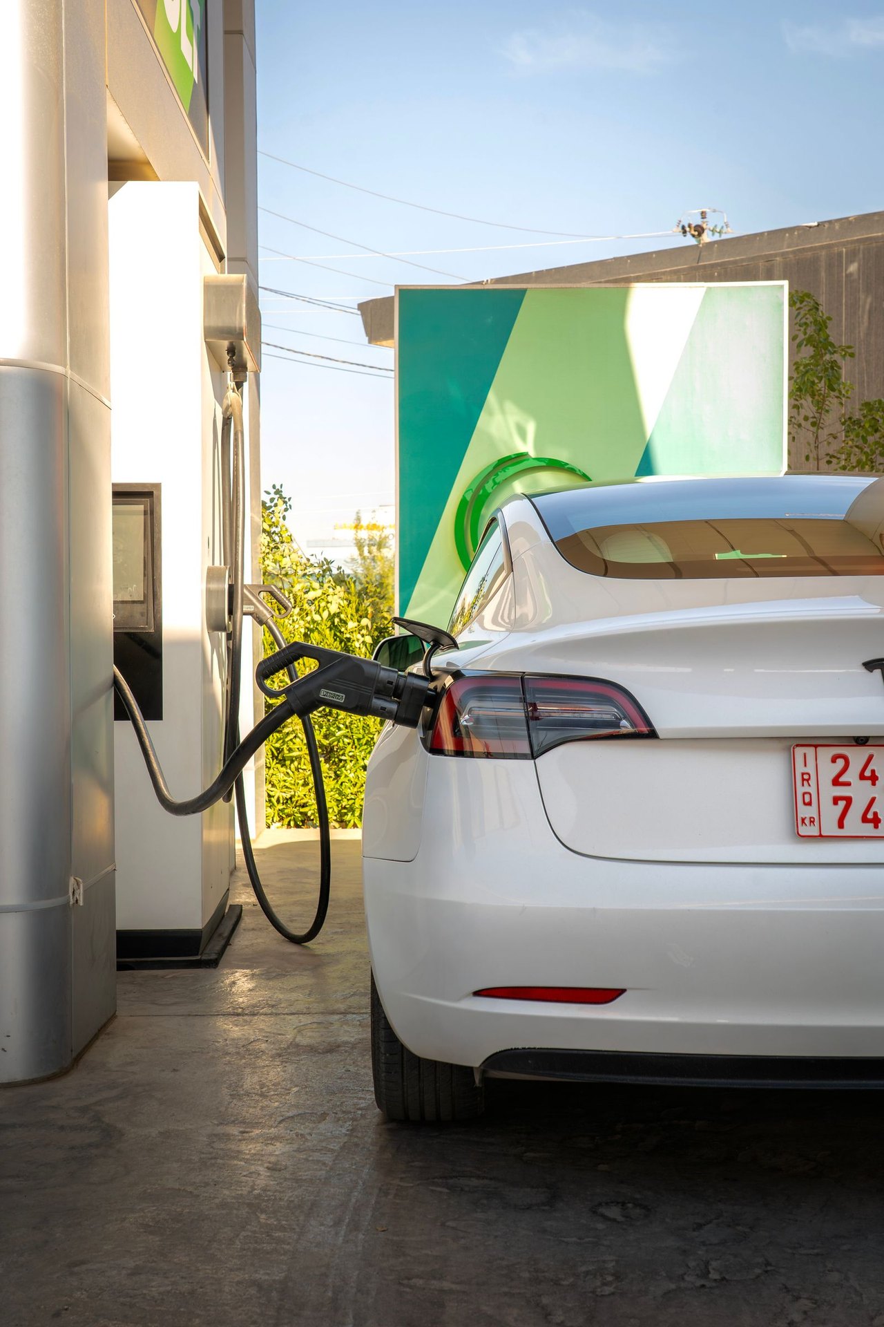 Tesla vehicle charging from a wall connector in a home garage