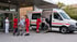 Geplanter Krankentransport und Patientenmobilität mit Rollstuhlrampe, Rollstuhltransfer und begleitetem Rollator